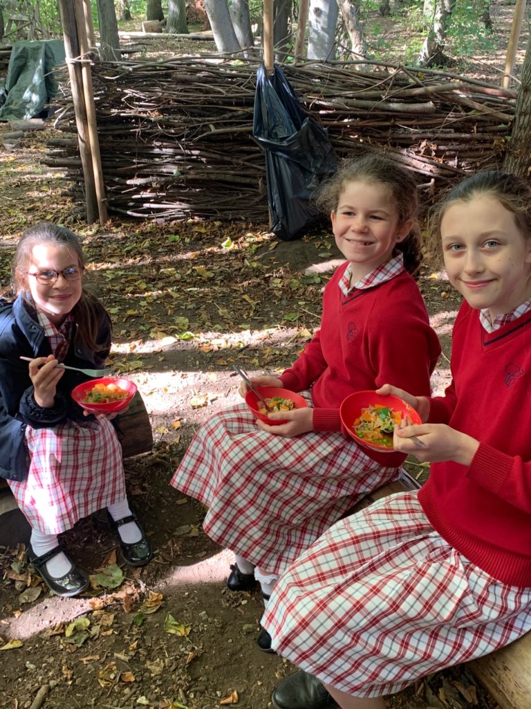 Y6 cook traditional Spanish Paella over the fire, Copthill School